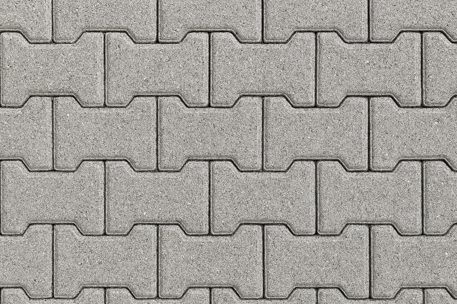 Blocos intertravados de concreto em padrão de encaixe